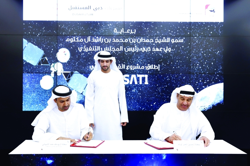 Hamdan bin Mohammed witnesses the signing of the construction agreement of the 1st environmental satellite 