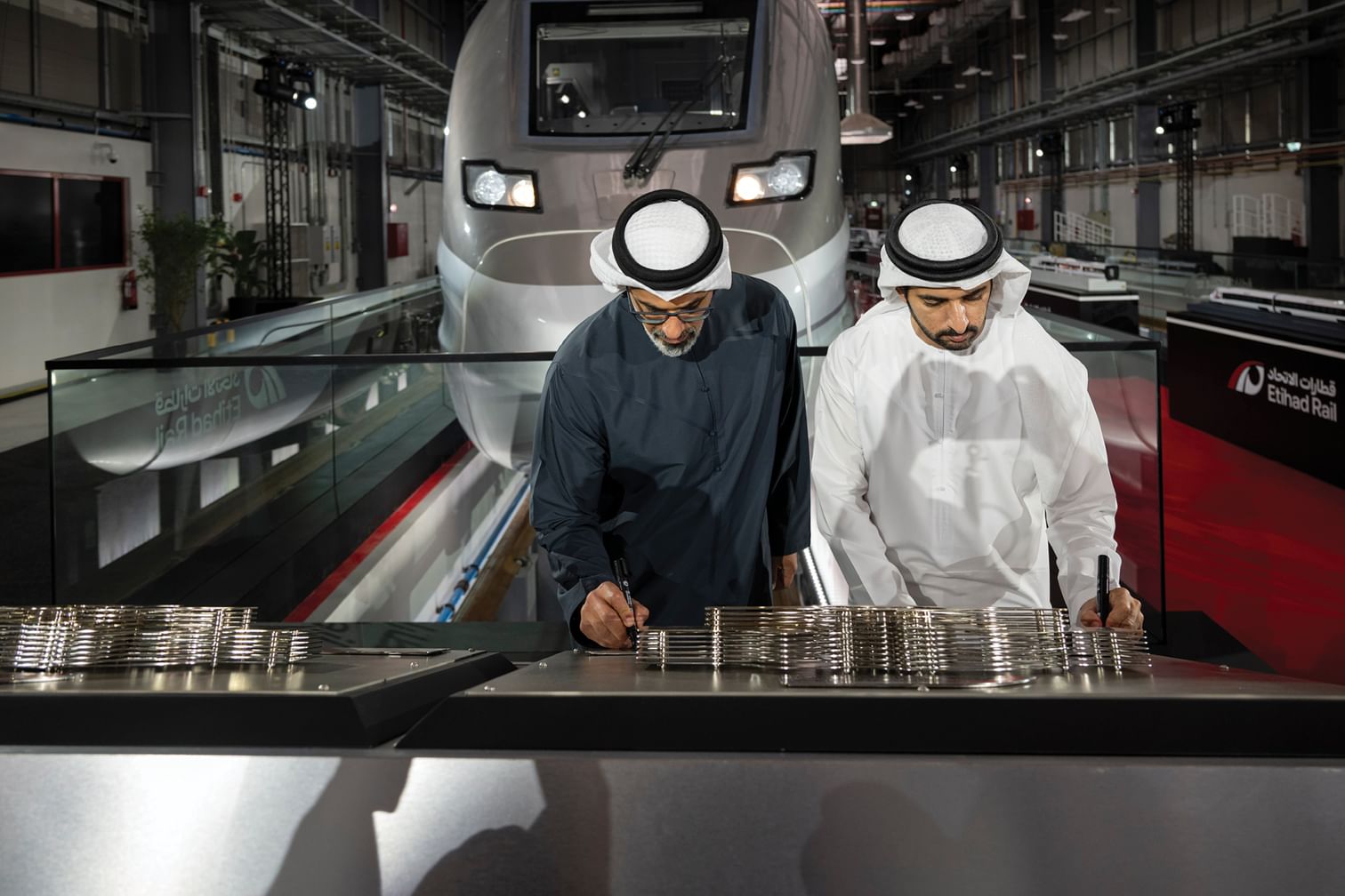 Khaled bin Mohamed bin Zayed, Hamdan bin Mohammed bin Rashid witness announcement of high-speed train project linking Abu Dhabi, Dubai
